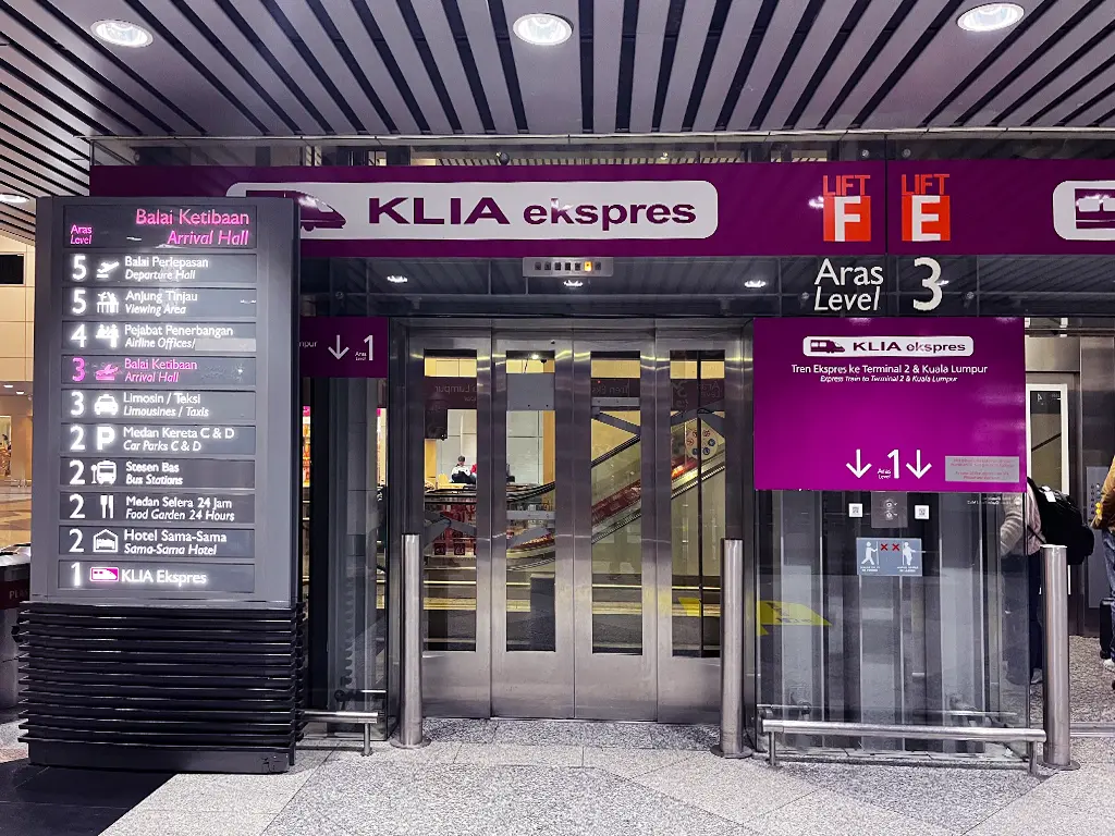 KLIA Terminal 1 Arrival Hall lift signage to KLIA Ekspres