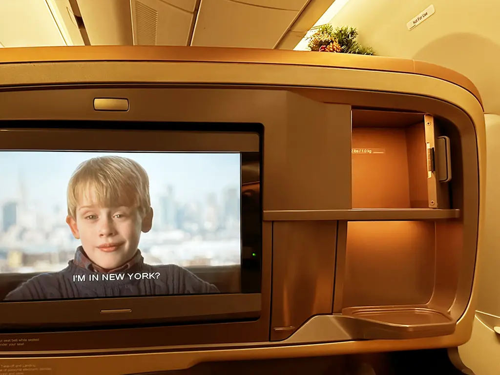 Business Class seat IFE panel with stowage compartment on Singapore Airlines SQ22 SIN-EWR A350-900ULR