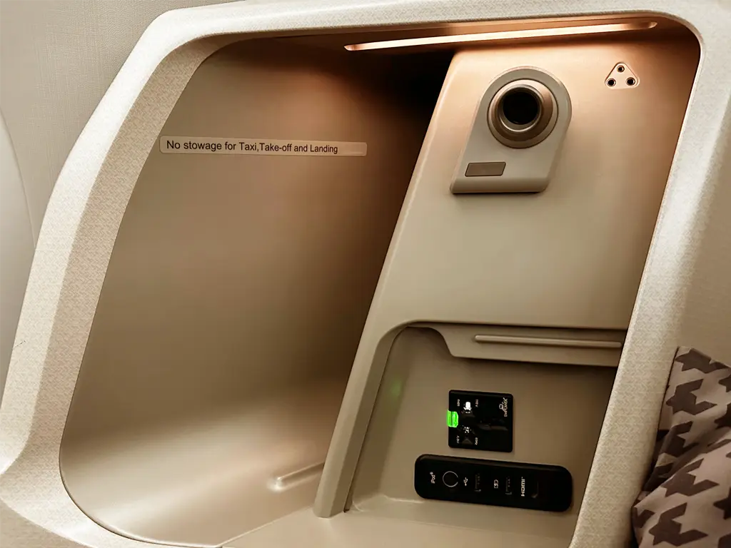 Business Class seat side console stowage, power supply and media ports on Singapore Airlines SQ22 SIN-EWR A350-900ULR