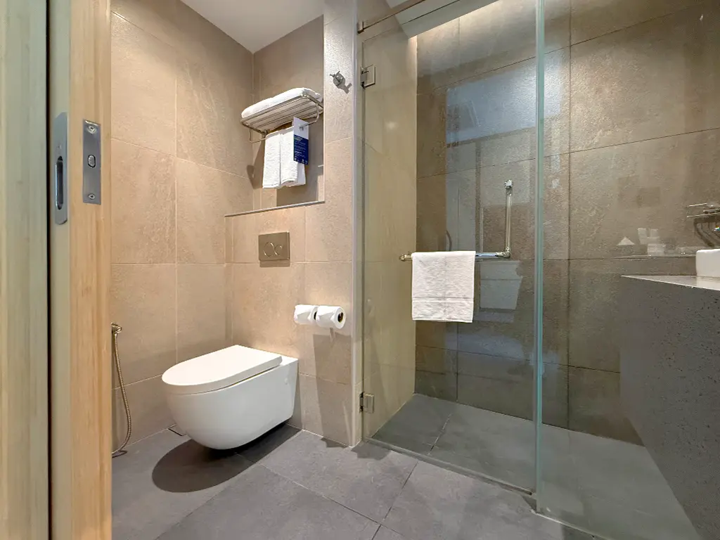 Guest Room seated toilet with handheld bidet and towel rack, Four Points by Sheraton Kuala Lumpur, Chinatown